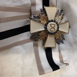 Dolce & Gabbana Cream and Gold Cross Brooch with Striped Ribbon